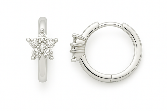 Moissanite starburst huggie earrings in 925 silver, featuring a radiant cluster design. A dazzling statement of elegance and charm. Available now at BSI Jewelry.