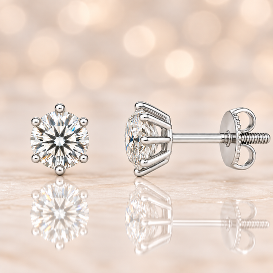 Moissanite stud earrings, 4.8 mm round cut, crafted in white gold-plated 925 silver with palladium alloy, hypoallergenic and safe to wear. Now at BSI Jewelry.
