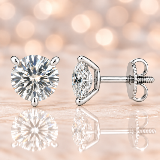 Moissanite stud earrings with 6.5 mm round stones in 3-prong setting, crafted in white gold-plated 925 silver. Elegant sparkle. Available now at BSI Jewelry.