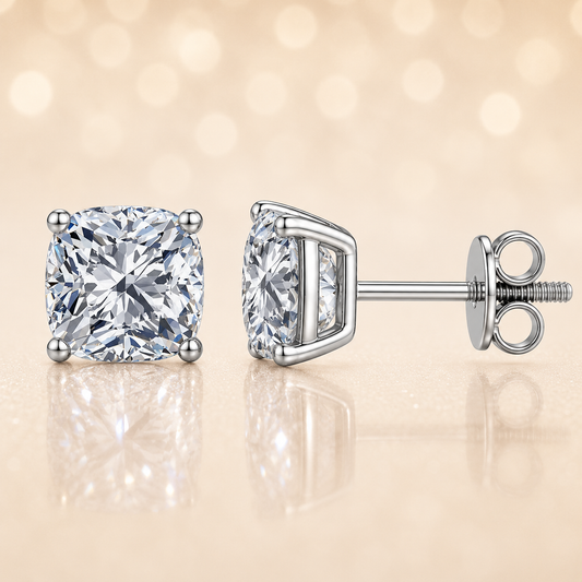 Moissanite Stud Earrings, 6 mm cushion cut, crafted in white gold-plated 925 silver with palladium-added alloy. Elegant and hypoallergenic. Now at BSI Jewelry.