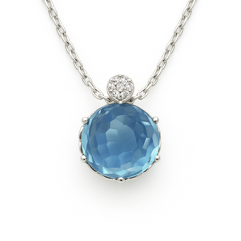 Stunning Swiss blue topaz cabochon pendant accented with Moissanite in 925 silver. 9mm gem, hypoallergenic and timelessly elegant. Available now at BSI Jewelry.