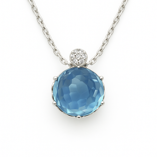 Stunning Swiss blue topaz cabochon pendant accented with Moissanite in 925 silver. 9mm gem, hypoallergenic and timelessly elegant. Available now at BSI Jewelry.