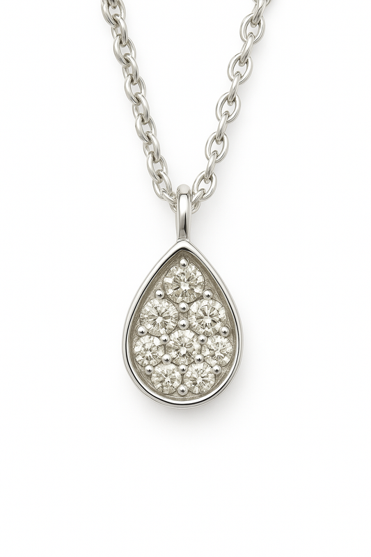 Radiant Moissanite teardrop pendant in 925 silver with pavé brilliance and refined finish. Hypoallergenic and elegant for daily wear. Available at BSI Jewelry.