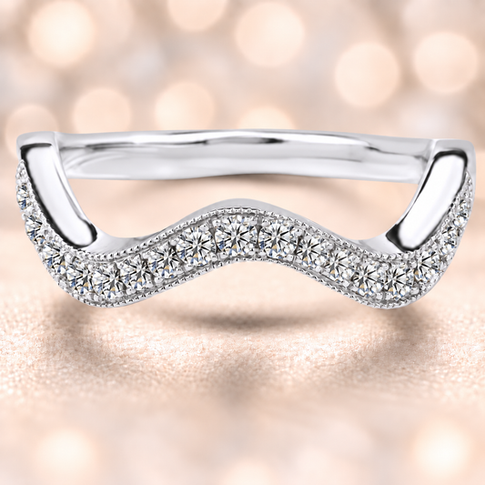 An elegant wave-shaped wedding band featuring 17 Moissanite stones totaling 0.70 carat, crafted in white-gold-plated 925 silver for timeless sparkle and charm.