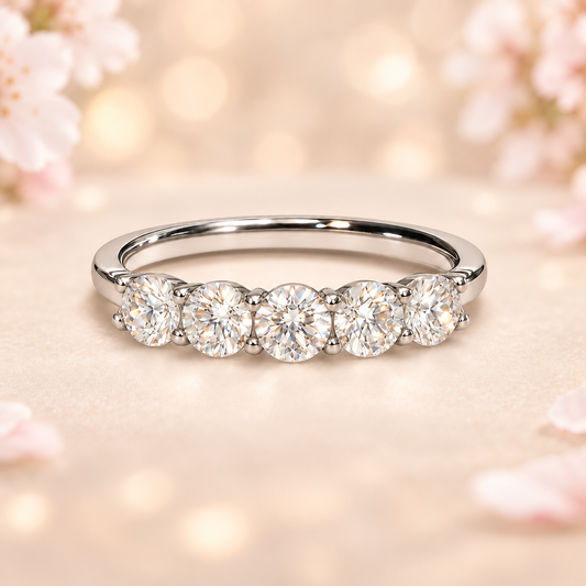 Moissanite wedding band in white gold-plated 925 silver, featuring a row of brilliant stones for timeless sparkle and eternal love. Available now at BSI Jewelry.