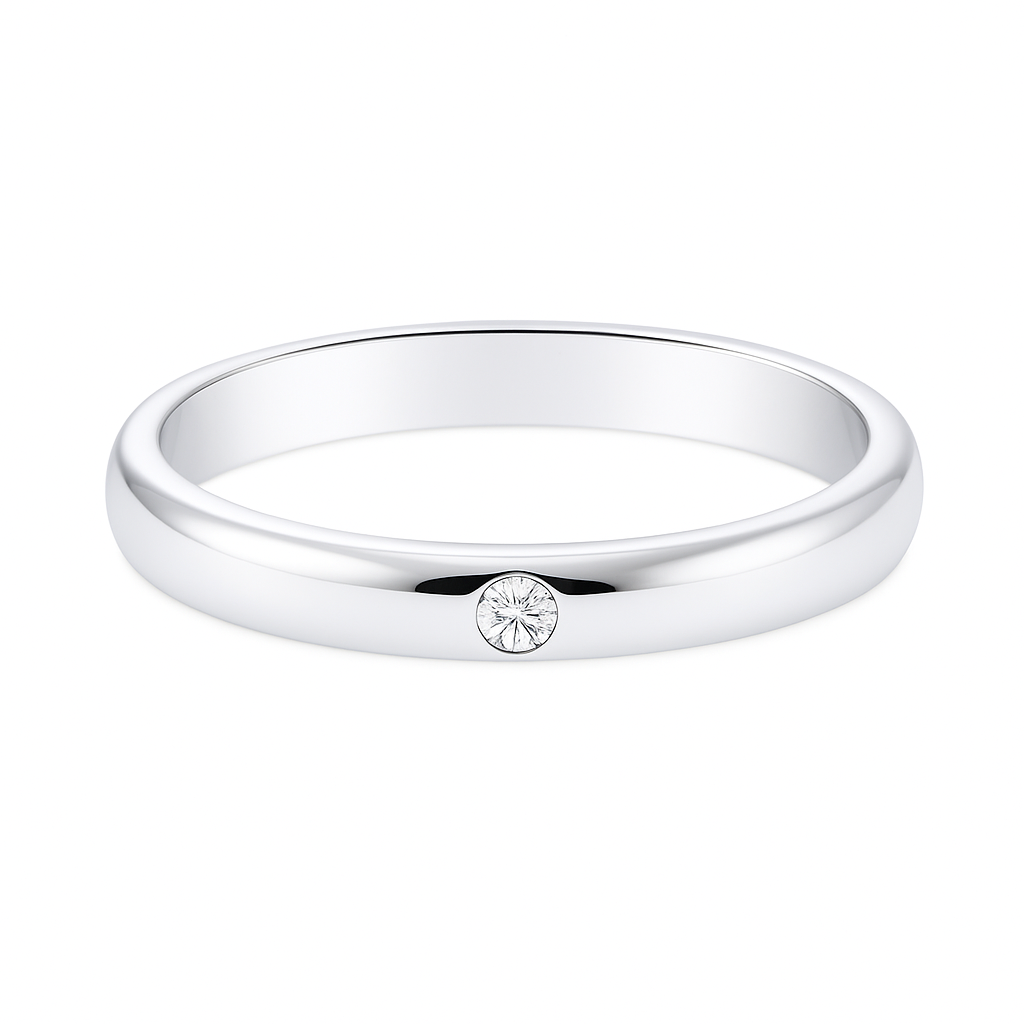 Moissanite wedding band with one round brilliant stone in 2.50 mm width. White-gold-plated 925 silver, hypoallergenic and elegant. Available now at BSI Jewelry.