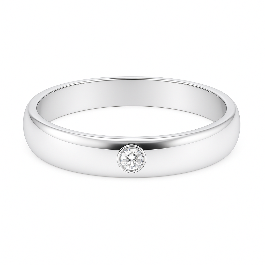 Sleek Moissanite wedding band with a single round brilliant in 3.50 mm width. White gold-plated 925 silver with palladium alloy. Available now at BSI Jewelry.