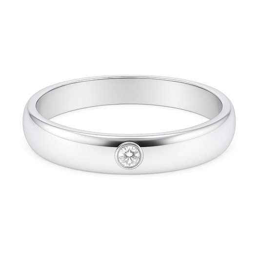 Sleek Moissanite wedding band with a single round brilliant in 3.50 mm width. White gold-plated 925 silver with palladium alloy. Available now at BSI Jewelry.