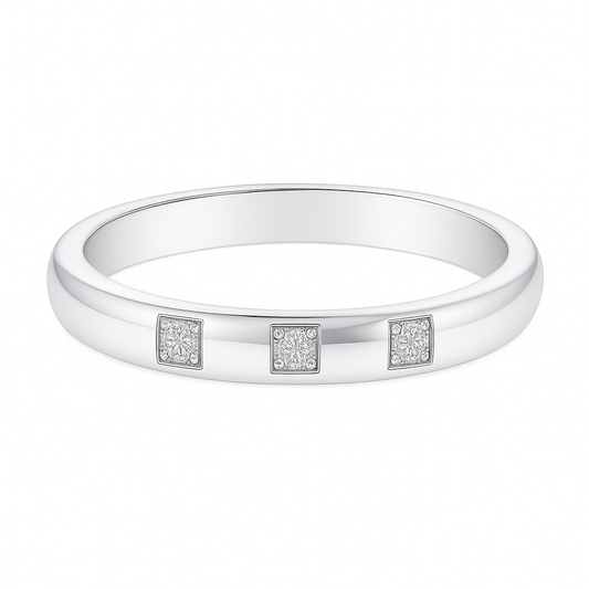 Elegant three-stone Moissanite wedding band with 2.50 mm width, crafted in white gold-plated 925 silver with palladium alloy. Available now at BSI Jewelry.