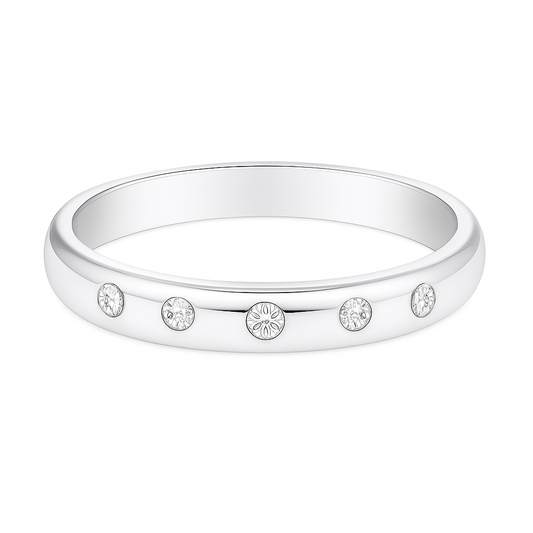 Timeless Moissanite wedding band with five round brilliant stones in 2.50 mm width. White gold-plated 925 silver with palladium alloy. Now at BSI Jewelry.