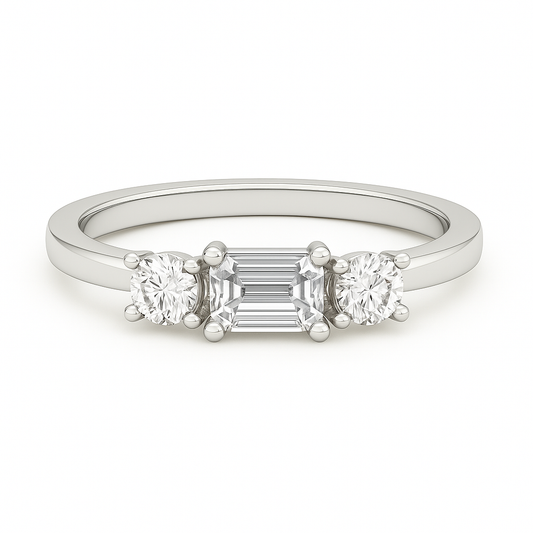 Moissanite wedding band with 5×3 mm emerald-cut and 3 mm round in white gold-plated 925 silver with palladium alloy. Elegant and radiant. Now at BSI Jewelry.