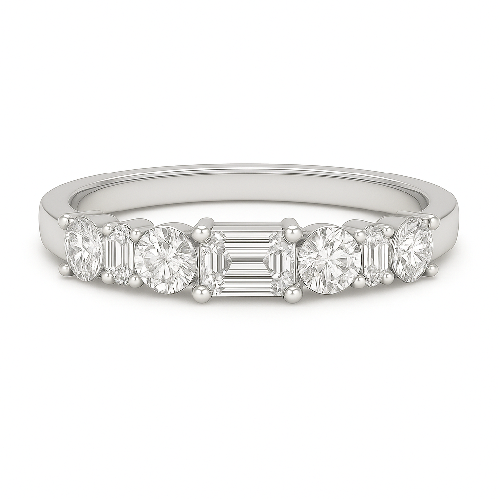 Moissanite wedding band with 5×3 mm emerald-cut and 3 mm round in white gold-plated 925 silver with palladium alloy. Elegant and refined. Now at BSI Jewelry.