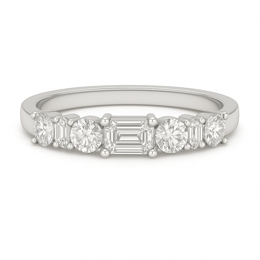 Moissanite wedding band with 5×3 mm emerald-cut and 3 mm round in white gold-plated 925 silver with palladium alloy. Elegant and refined. Now at BSI Jewelry.