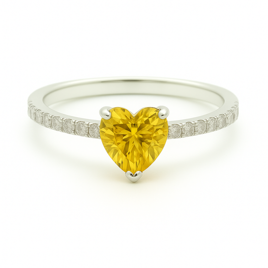 6mm heart-cut Yellow Sapphire ring with Moissanite accents in white-gold-plated 925 silver. Elegant, timeless, and hypoallergenic. Available now at BSI Jewelry.