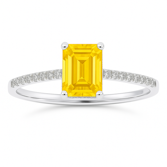 Emerald-cut 7×5 mm yellow sapphire ring with Moissanite on white gold-plated 925 silver. Elegant, radiant, and hypoallergenic. Available now at BSI Jewelry.