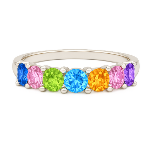 Multi-color gemstone ring with seven 3 mm round-cut stones in white gold-plated 925 silver, creating a refined rainbow look. Shop BSI Jewelry.