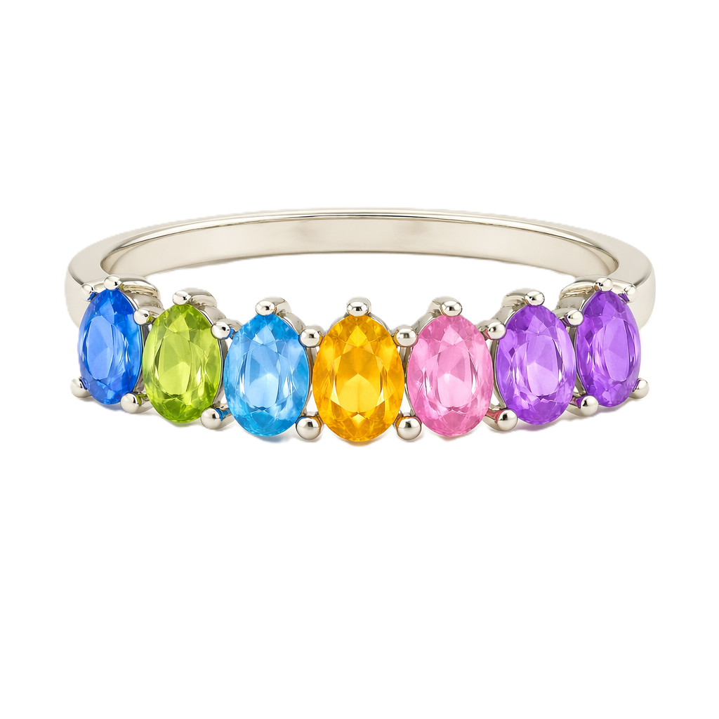 Multi-color gemstone ring with seven 5×3 mm oval-cut stones in white gold-plated 925 silver, creating a refined rainbow look. Shop BSI Jewelry.