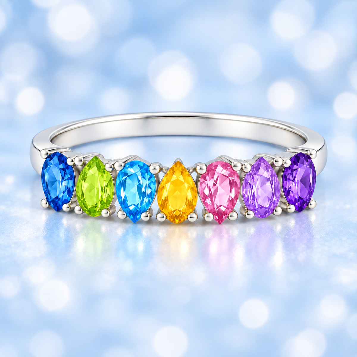 Multi-color gemstone ring with five 5×3 mm pear-cut stones in white gold-plated 925 silver, creating a refined rainbow look. Shop BSI Jewelry.
