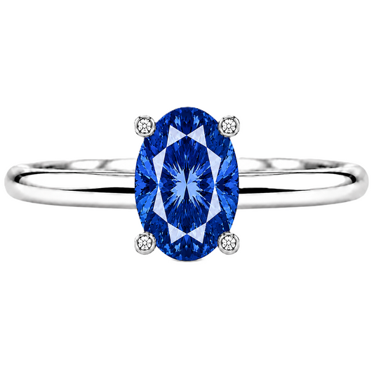 Blue sapphire engagement ring featuring a 6×4 mm oval gemstone in white gold-plated 925 silver. Royal and hypoallergenic. Available now at BSI Jewelry.