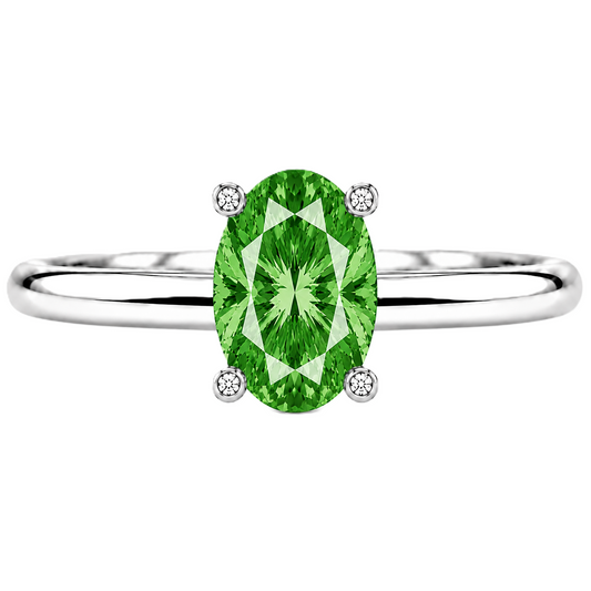 Green sapphire engagement ring featuring a 6×4 mm oval gemstone in white gold-plated 925 silver. Vibrant and hypoallergenic. Available now at BSI Jewelry.