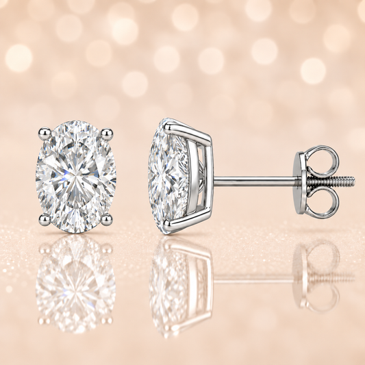 Oval moissanite stud earrings, 8×6 mm oval shape, set in white gold-plated 925 silver. Brilliant sparkle, hypoallergenic, and timeless. Available now at BSI Jewelry.
