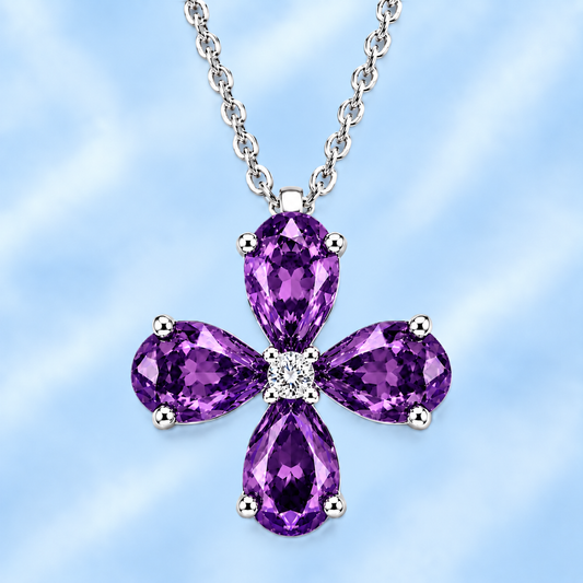 Pear amethyst flower pendant featuring four 5×4 mm pear gemstones in white gold-plated 925 silver with moissanite accent and available now at BSI Jewelry.