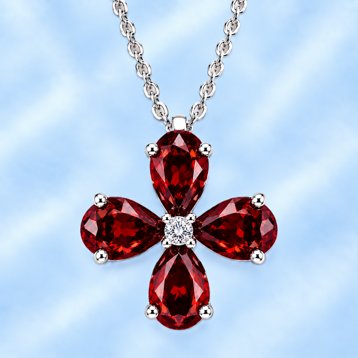 Pear garnet flower pendant featuring four 5×4 mm pear gemstones in white gold-plated 925 silver with moissanite accent and available now at BSI Jewelry.