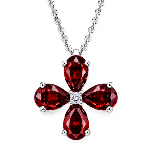 Pear garnet flower pendant featuring four 5×4 mm pear gemstones in white gold-plated 925 silver with moissanite accent and available now at BSI Jewelry.