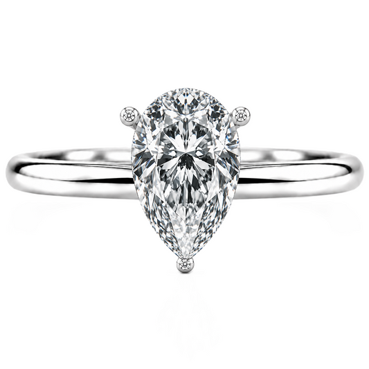 Timeless pear moissanite engagement ring with a 6×4 mm pear-cut center stone, crafted in white gold plated 925 silver. Available now at BSI Jewelry.