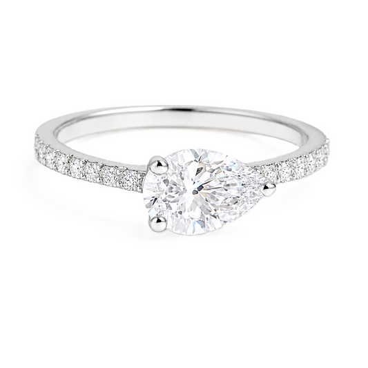 Fall in love with this 7×5mm Pear Moissanite Engagement Ring in White Gold Plated 925 Silver. GRA Certified, hypoallergenic, and finely crafted by BSI Jewelry.