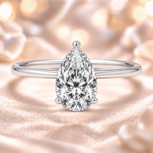 Elegant 8×6 mm Pear Moissanite Engagement Ring in White Gold Plated 925 Silver. GRA Certified, hypoallergenic. Finely crafted by BSI Jewelry.