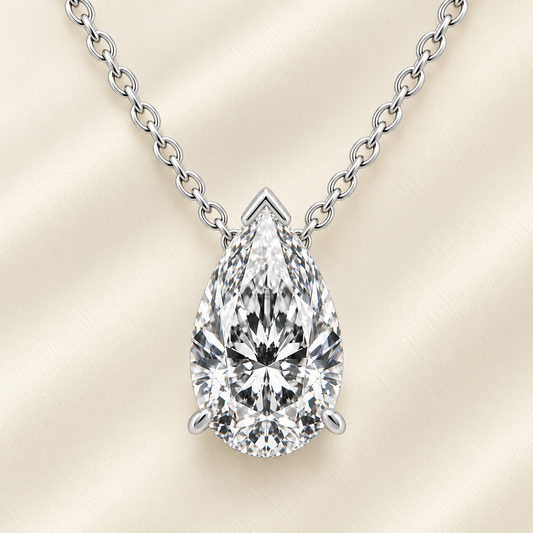 Pear moissanite necklace, 9×6 mm pear, set in white gold-plated 925 silver. Brilliant sparkle, elegant and timeless for daily wear. Available now at BSI Jewelry.