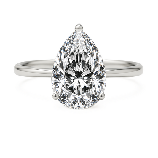 Pear moissanite ring, 10×7 mm, crafted in white gold-plated 925 silver. Brilliant and elegant for daily wear. Available now at BSI Jewelry.