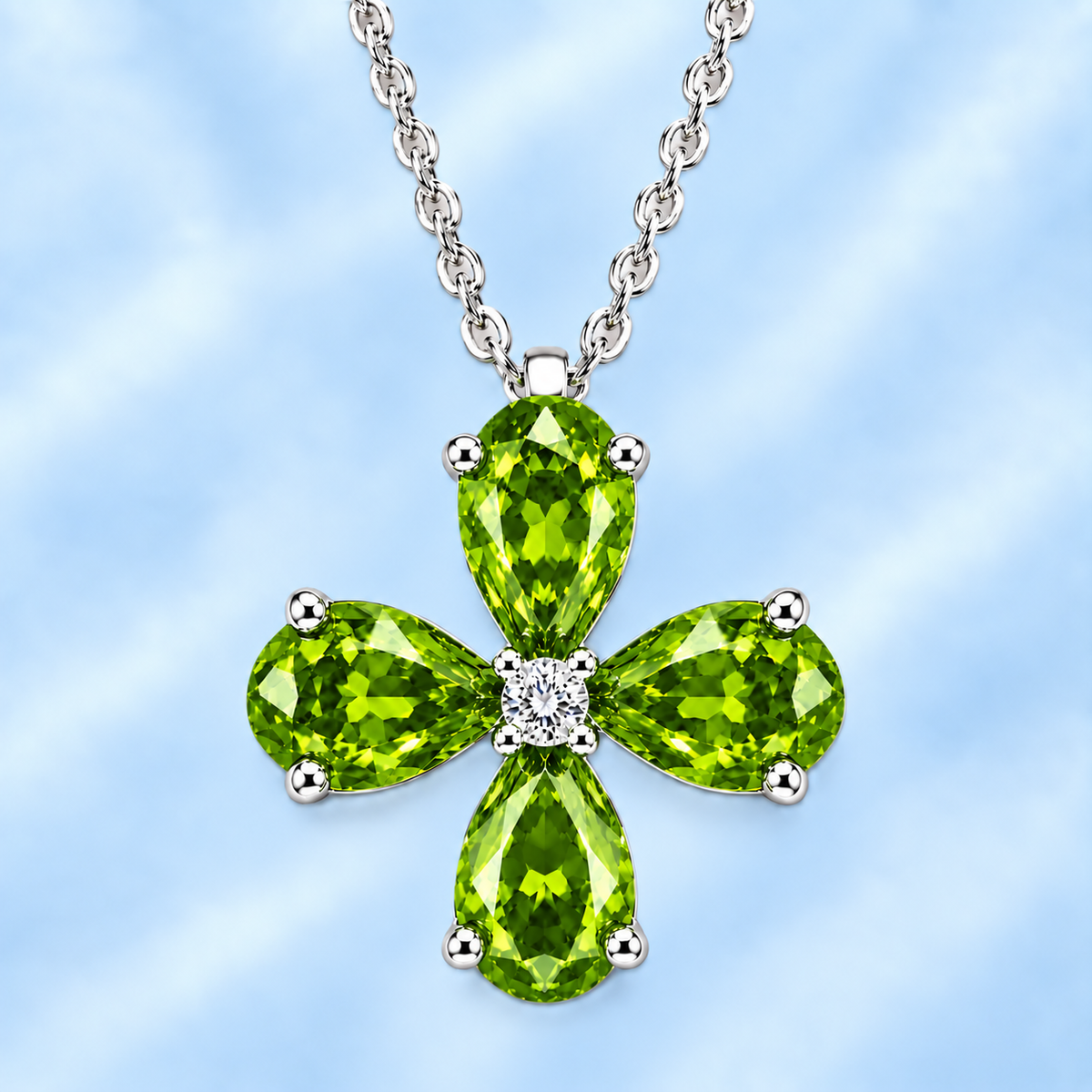 Pear peridot flower pendant featuring four 5×4 mm pear gemstones in white gold-plated 925 silver with moissanite accent and available now at BSI Jewelry.