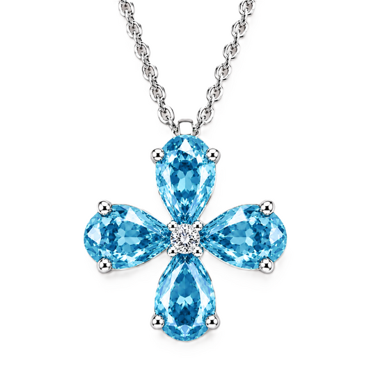 Pear sky blue topaz flower pendant featuring four 5×4 mm pear gemstones in white gold-plated 925 silver with moissanite accent and available now at BSI Jewelry.