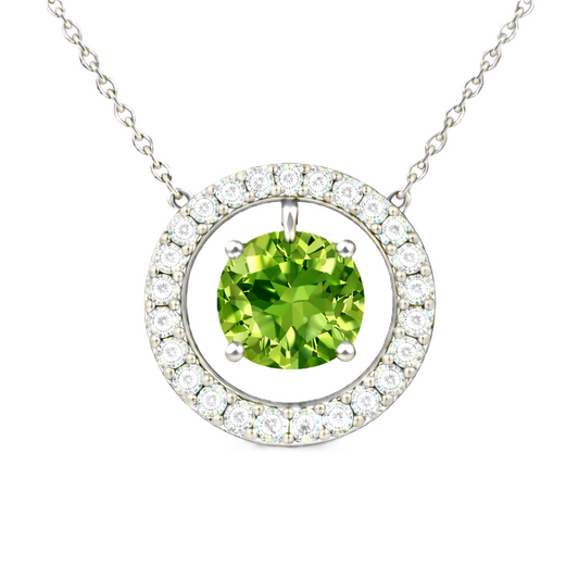 Peridot necklace with a 6 mm round gemstone and moissanite halo in white gold-plated 925 silver. Elegant and radiant. Available now at BSI Jewelry.