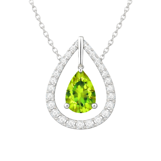 Peridot necklace with a 7×5 mm pear-cut in white gold-plated 925 silver, accented by a moissanite halo. Elegant and refined. Available now at BSI Jewelry.
