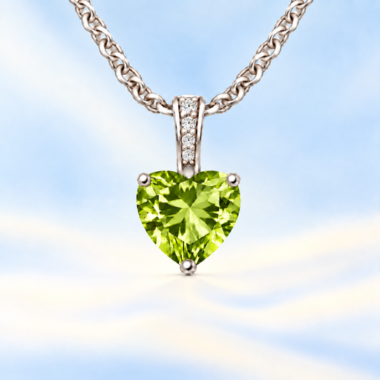 Peridot pendant with a 6 mm heart gemstone in white gold-plated 925 silver. Fresh, elegant, and radiant for daily wear. Available now at BSI Jewelry.
