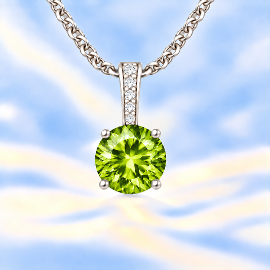 Peridot pendant with a 6 mm round cut, set in white gold-plated 925 silver. Fresh, luminous, and elegant for daily wear. Available now at BSI Jewelry.