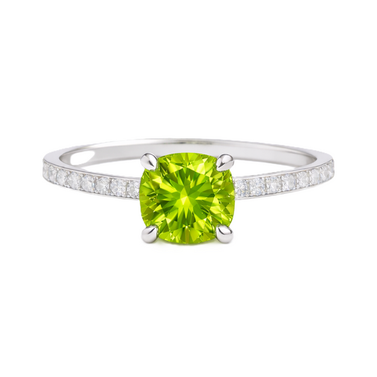 Peridot ring with a 6 mm cushion in white gold-plated 925 silver, accented with moissanite. Fresh and elegant for daily wear. Available now at BSI Jewelry.