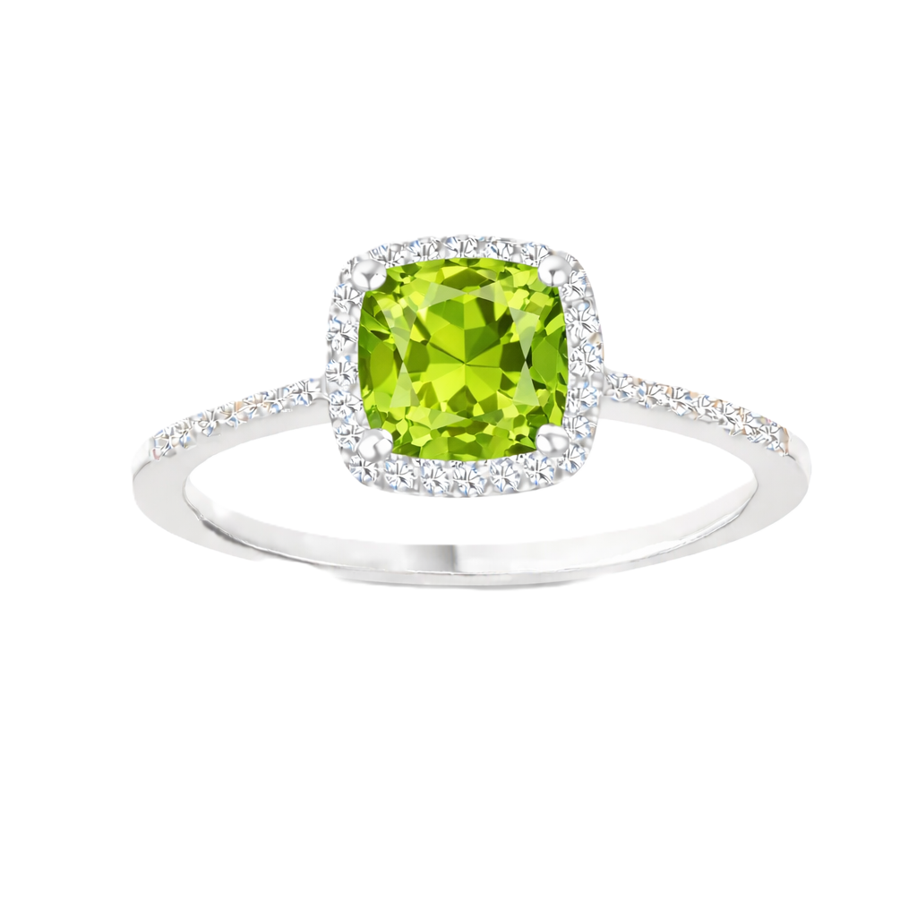 Peridot ring with a 6 mm cushion-cut center in white gold-plated 925 silver, accented with moissanite for refined sparkle. Available now at BSI Jewelry.