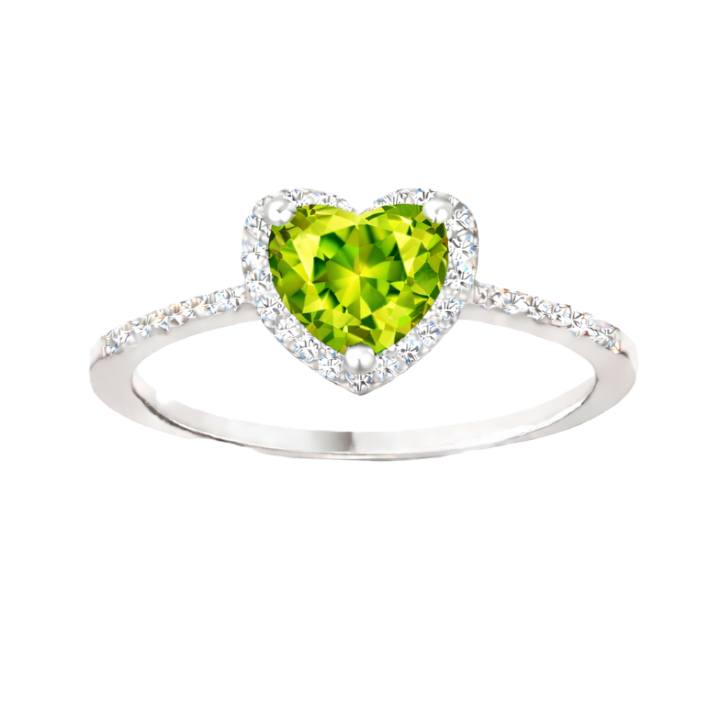 Peridot ring with a 6 mm heart cut, crafted in white gold-plated 925 silver and accented with moissanite. Available now at BSI Jewelry.