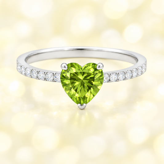 Peridot ring with a 6 mm heart-cut in white gold-plated 925 silver, accented with moissanite. Romantic and elegant for daily wear. Available now at BSI Jewelry.