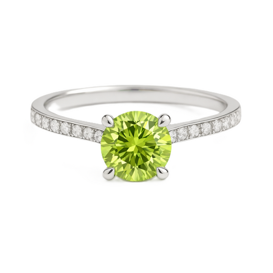 Peridot ring with a 6 mm round-cut and moissanite accents, crafted in white gold-plated 925 silver. Elegant for daily wear. Available now at BSI Jewelry.