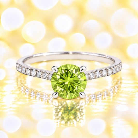 Peridot ring with a 6 mm round-cut and moissanite accents, crafted in white gold-plated 925 silver. Elegant for daily wear. Available now at BSI Jewelry.