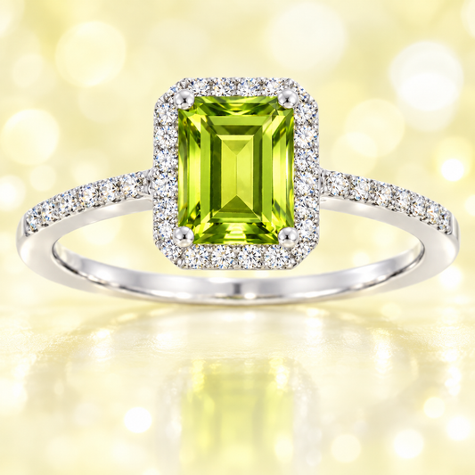 Peridot ring with a 7×5 mm emerald cut, with moissanite in white gold-plated 925 silver. Elegant and timeless for daily wear. Available now at BSI Jewelry.