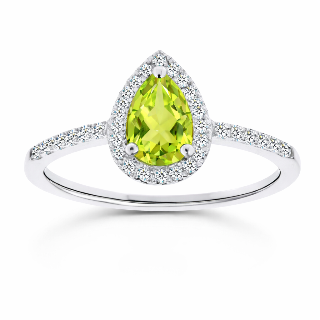 Peridot ring with a 7×5 mm pear cut, with moissanite in white gold-plated 925 silver. Elegant and timeless for daily wear. Available now at BSI Jewelry.