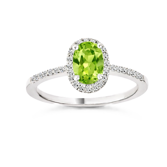 Peridot ring with a 7×5 mm oval-cut in white gold-plated 925 silver, accented with moissanite. Elegant and refined for daily wear. Available now at BSI Jewelry.