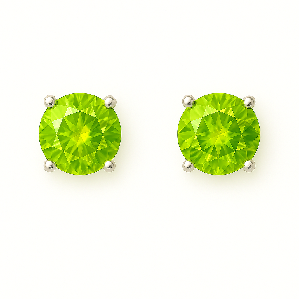 Fresh peridot stud earrings in white gold-plated 925 silver with prong setting. Bright brilliance and hypoallergenic, safe to wear. Available at BSI Jewelry.