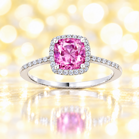 Pink amethyst ring with a 6 mm cushion-cut center in white gold-plated 925 silver, accented with moissanite for refined sparkle. Available now at BSI Jewelry.